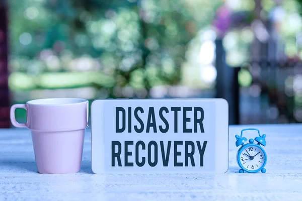 Writing displaying text Disaster Recovery. Business overview helping showing affected by a serious damaging event Abstract Outdoor Smartphone Photography, Displaying New Device — Foto Stock