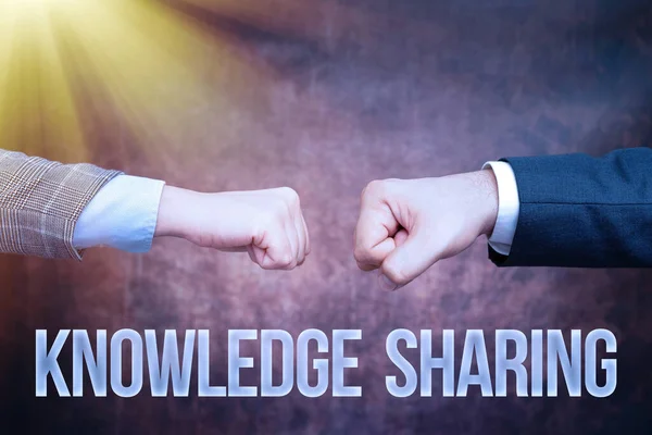 Text caption presenting Knowledge Sharing. Business concept deliberate exchange of information that helps with agility Two Professional Well-Dressed Corporate Businessmen Handshake Indoors — Zdjęcie stockowe