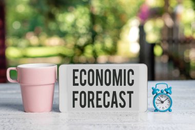 Text showing inspiration Economic Forecast. Word for attempting to predict the future condition of the economy Abstract Outdoor Smartphone Photography, Displaying New Device