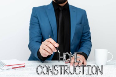 Hand writing sign Home Construction. Business overview the process of constructing a living accommodation Discussing Important Idea Presenting And Explaining Business Plan Designs