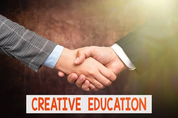 Conceptual display Creative Education. Business idea students able to use imagination and critical thinking Two Professional Well-Dressed Corporate Businessmen Handshake Indoors — Fotografia de Stock