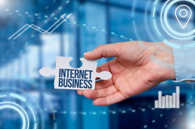 Text showing inspiration Internet Business. Business showcase business or commercial transactions that take place online Hand Holding Jigsaw Puzzle Piece Unlocking New Futuristic Technologies.