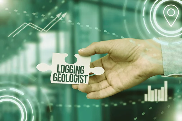 Sign displaying Logging Geologist. Word Written on Layout and execution of definition diamond drill programs Hand Holding Jigsaw Puzzle Piece Unlocking New Futuristic Technologies. — Stock fotografie