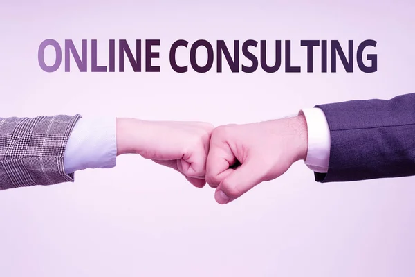 Sign displaying Online Consulting. Business approach get information or advice from a person through internet Two Professional Well-Dressed Corporate Businessmen Handshake Indoors