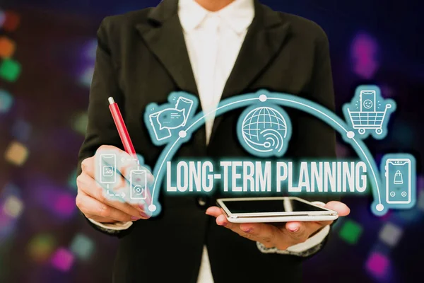 Text caption presenting Long Term Planning. Business idea establishing goals that you expected to achieve Lady In Uniform Holding Tablet In Hand Virtually Typing Futuristic Tech. — Stockfoto