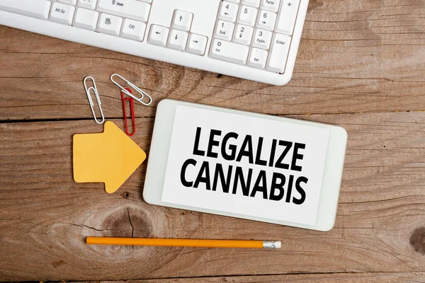 Hand writing sign Legalize Cannabis. Internet Concept law which legalized recreational cannabis use nationwide Display of Different Color Sticker Notes Arranged On flatlay Lay Background — Fotografia de Stock
