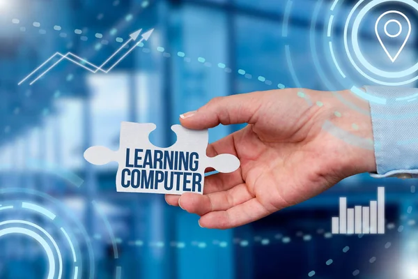 Text caption presenting Learning Computer. Business overview learn more about each of the components in the computer Hand Holding Jigsaw Puzzle Piece Unlocking New Futuristic Technologies. — Zdjęcie stockowe
