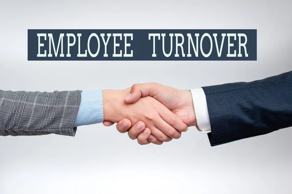 Text showing inspiration Employee Turnover. Business overview the percentage of workers who leave an organization Two Professional Well-Dressed Corporate Businessmen Handshake Indoors — Fotografia de Stock