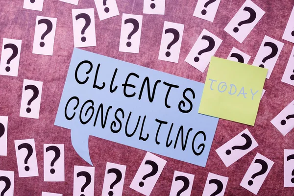 Почерк текста Clients Consulting. Бизнес-идея предоставления экспертных знаний третьей стороне за плату Вопросы Неопределенные Мысли, Обсуждение нерешенных проблем — стоковое фото