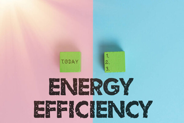 Sign displaying Energy Efficiency. Word for reduce the amount of energy required to provide product Two Objects Arranged Facing Inward Outward On a Separated Coloured Background