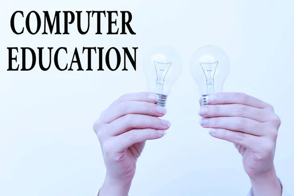 Conceptual caption Computer Education. Business overview gaining basic knowledge and skills to operate computers two Hands holding lamp showing or presenting new technology ideas — Stockfoto
