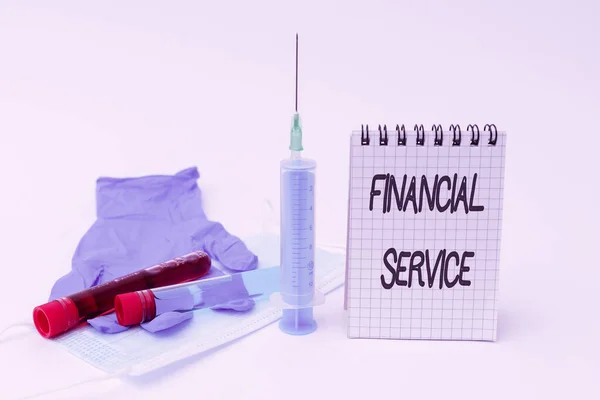Text showing inspiration Financial Service. Word for economic services provided by the finance industry Writing Important Medical Notes Laboratory Testing Of New Infections — Stock Photo, Image