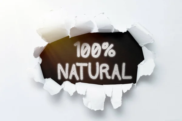 Conceptual caption 100 Percent Natural. Business overview does not contain artificial ingredients or preservatives Tear on sheet reveals background behind the front side — Stok Foto