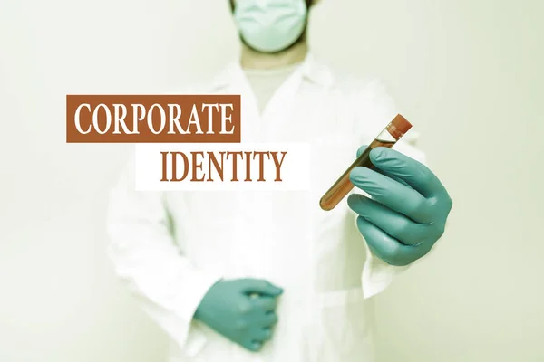 Writing displaying text Corporate Identity. Business approach firm or business presents themselves to the public Chemist Presenting Blood Sample, Scientist Analyzing Research Specimen — Zdjęcie stockowe
