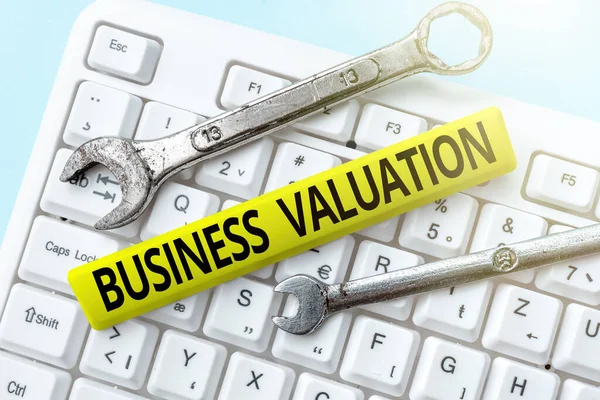 Inspiration showing sign Business Valuation. Conceptual photo determining the economic value of a whole business Typing Firewall Program Codes, Typewriting Rules And Regulations Book — Stockfoto