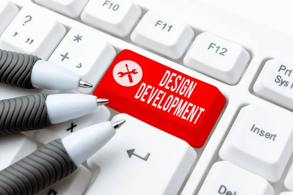 Text sign showing Design Development. Business idea technical aspects of materials and building systems Typing Product Title And Descriptions, Entering Important Data Codes — Stock Photo, Image