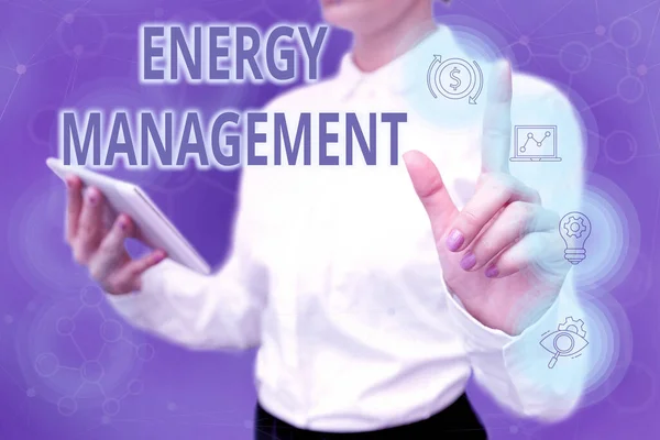 Conceptual caption Energy Management. Business showcase way of tracking and monitoring energy to conserve usage Lady In Uniform Standing Hold Phone Virtual Press Button Futuristic Tech.