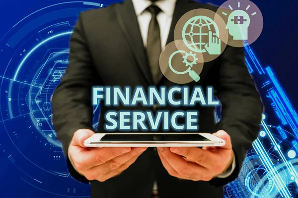 Text showing inspiration Financial Service. Business approach economic services provided by the finance industry Man In Office Uniform Holding Tablet Displaying New Modern Technology.