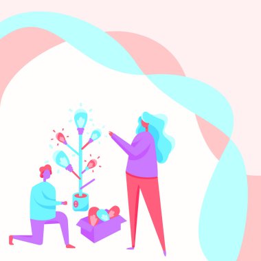 Erkek ve kadın, cam dolu bir kutunun yanında diz çökmüş ampul ağacı çiziyor. Meslektaşlar Parlayan Cam Nesne Yapıyor.