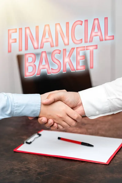Handwriting text Financial Basket. Business showcase group of securities created for simultaneous buy or sell Two Professional Well-Dressed Corporate Businessmen Handshake Indoors — Stock fotografie
