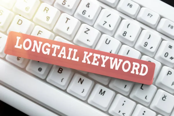 Conceptual caption Longtail Keyword. Internet Concept search phrases that are highly relevant to specific niche Typing Program Code Script, Abstract Downloading New Online Journal — ストック写真