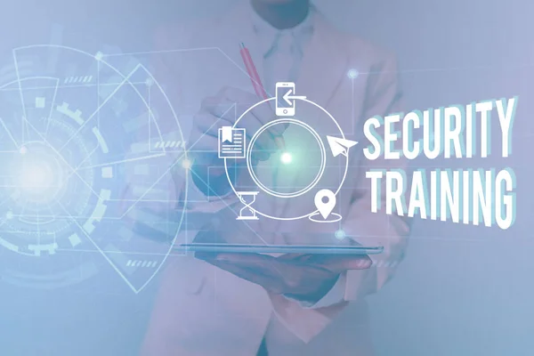 Hand writing sign Security Training. Business overview providing security awareness training for end users Woman In Uniform Standing Holding Tablet Showing Futuristic Interface. — 스톡 사진