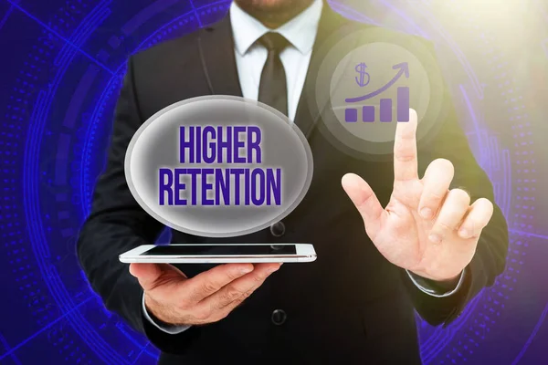Writing displaying text Higher Retention. Business approach ability of an organization to retain its employees Man In Office Uniform Standing Pressing Virtual Button Holding Tablet. — Stok fotoğraf