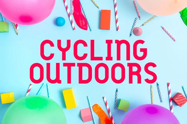 Conceptual caption Cycling Outdoors. Concept meaning sport or technique of riding or racing on a bicycle Colorful Birthday Party Designs Bright Celebration Planning Ideas — Stok fotoğraf