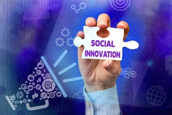 Conceptual caption Social Innovation. Internet Concept practices that aim to meet social needs in a better way Hand Holding Jigsaw Puzzle Piece Unlocking New Futuristic Technologies. —  Fotos de Stock