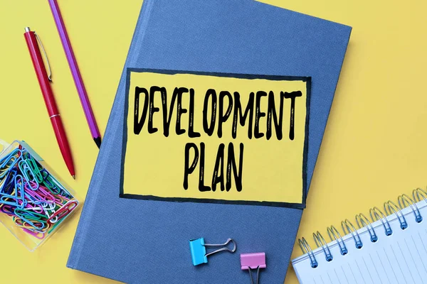 Text showing inspiration Development Plan. Internet Concept the planning of the development of an area of land Flashy School And Office Supplies Bright Teaching And Learning Collections — Stockfoto