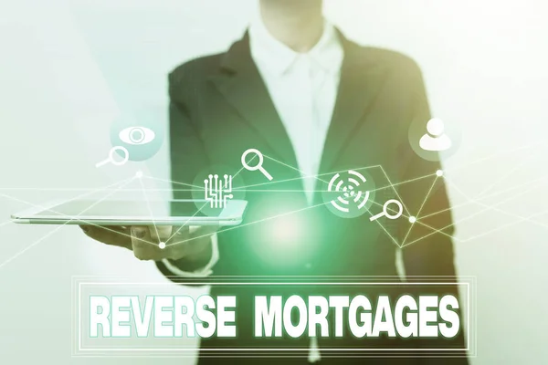 Writing displaying text Reverse Mortgages. Business showcase borrower to access the unencumbered value of the property Woman In Uniform Displaying Mobile Device Futuristic Virtual Tech.