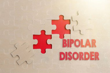 Bipolar bozukluk göstergesi. Ciddi yüksek ve düşük ruh halleri getiren iş genel bakışı zihinsel hastalıklar tamamlanmamış bir beyaz testere deseni bulmacası Son Parçası Eksik