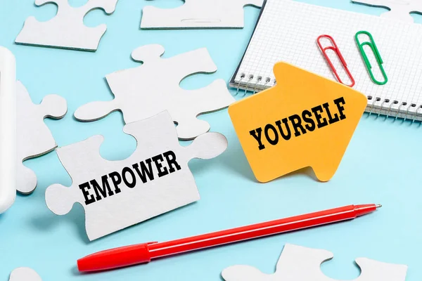 Handwriting text Empower Yourself. Word for giving you the power to take control of your own destiny Building An Unfinished White Jigsaw Pattern Puzzle With Missing Last Piece — Stock Photo, Image