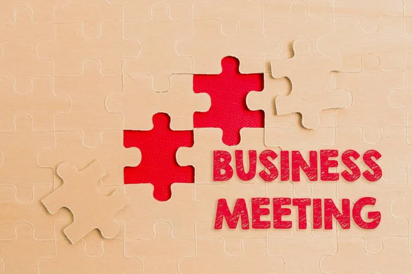 Handwriting text Business Meeting. Concept meaning gathering of two or more showing to discuss business ideas Building An Unfinished White Jigsaw Pattern Puzzle With Missing Last Piece