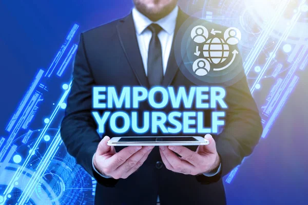 Text caption presenting Empower Yourself. Word for giving you the power to take control of your own destiny Man In Office Uniform Holding Tablet Displaying New Modern Technology. — стоковое фото