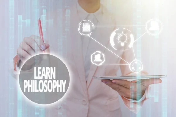 Hand writing sign Learn Philosophy. Concept meaning learn to develop sound methods of research and analysis Lady In Uniform Touching And Using Futuristic Holographic Technology.