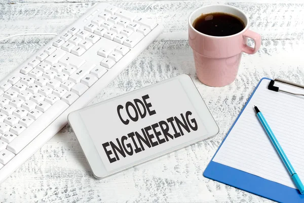 Hand writing sign Code Engineering. Business approach application of engineering to the development of software Wireless Communications Voice And Video Calls Writing Important Notes