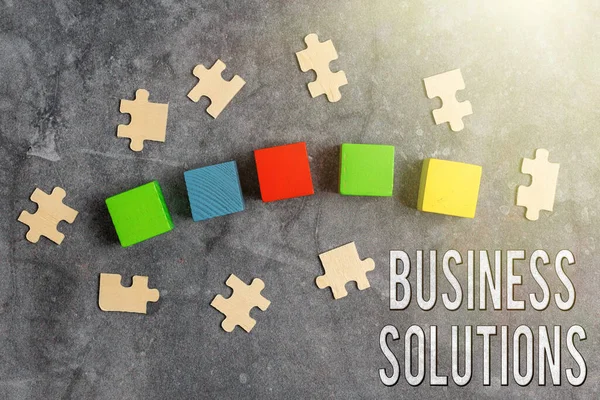 Texte manuscrit Business Solutions. Mot pour les idées utilisées pour aider une entreprise à atteindre ses objectifs Stack of Sample Cube Rectangular Boxes On Surface Polished With Multi-Colour — Photo