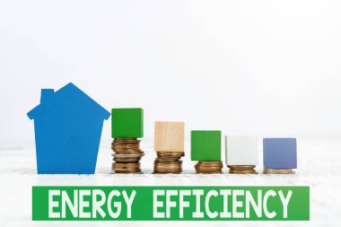 Metin başlığı Enerji Verimliliğini gösteriyor. İnternet Konsepti ürün satışı, Arazi Sahipliği, Yeni Mülk Yatırımı, Satış Sözleşmesi yaratmak için gereken enerji miktarını azaltır