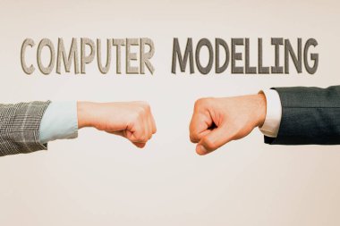 El yazısı işareti Bilgisayar Modelliği. Bir bilgisayar kullanarak iki profesyonel iyi giyimli iş adamı iç mekanda el sıkışırken bir plan ya da tasarım yapmak.