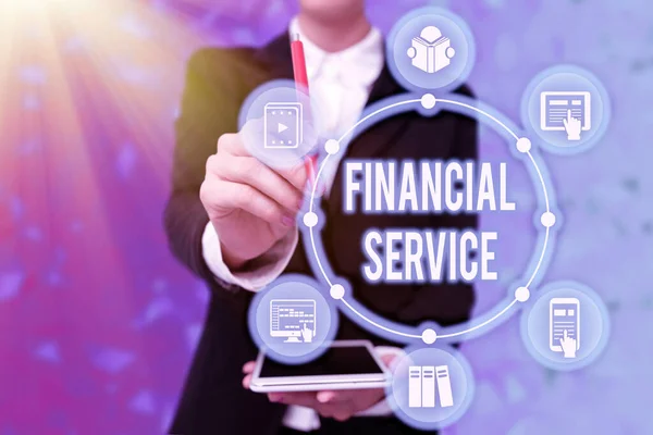 Sign displaying Financial Service. Conceptual photo economic services provided by the finance industry Lady In Uniform Holding Tablet In Hand Virtually Typing Futuristic Tech. — Stock Photo, Image