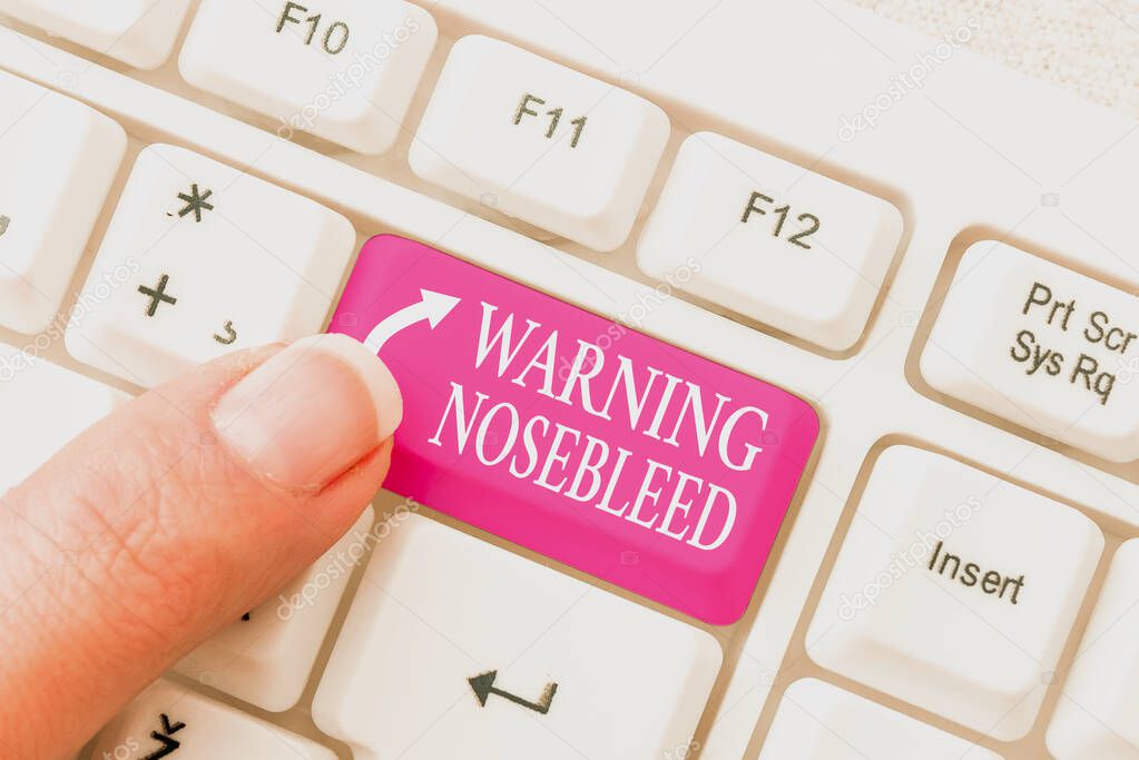 Text sign showing Warning Nosebleed. Concept meaning caution on bleeding from the blood vessels in the nose Typing Difficult Program Codes, Writing New Educational Book