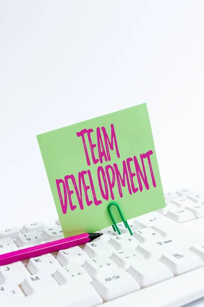 Text showing inspiration Team Development. Business showcase the enhancement of the effectiveness of work groups Computer Laptop For Communication Typing New Ideas And Plan Development — Stock Photo, Image