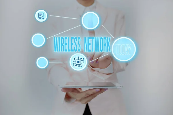 Text showing inspiration Wireless Network. Business overview computer network that uses wireless data connections Lady Holding Tablet Pressing On Virtual Button Showing Futuristic Tech. — Stock Photo, Image
