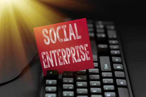 Text sign showing Social Enterprise. Concept meaning commercial organization that has specific social objective Typing Old Notes To A Computer, Abstract Creating Emotional Novel — Stock Photo, Image