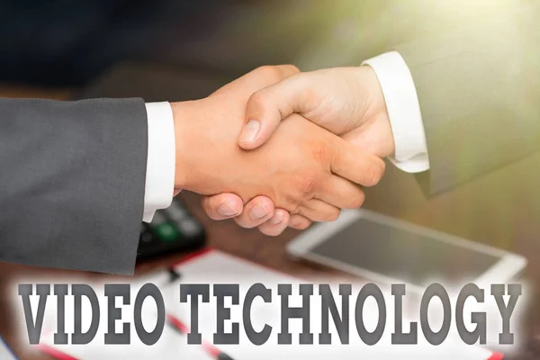 Inspiration showing sign Video Technology. Conceptual photo recording and playing back of moving pictures and sound Two Professional Well-Dressed Corporate Businessmen Handshake Indoors — Stock Photo, Image