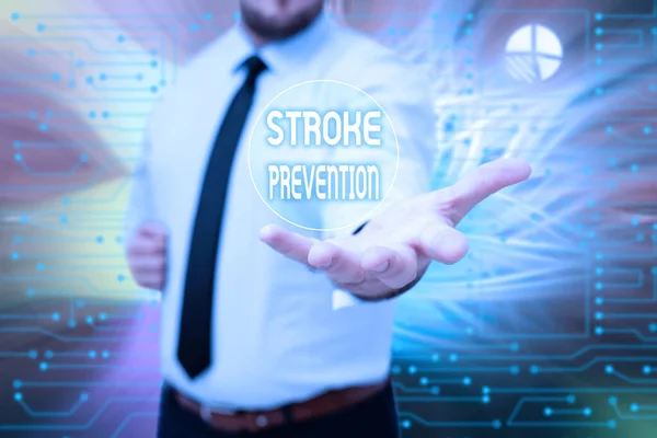 Conceptual caption Stroke Prevention. Word Written on identified personal risk factors and change lifestyle Gentelman Uniform Standing Holding New Futuristic Technologies.