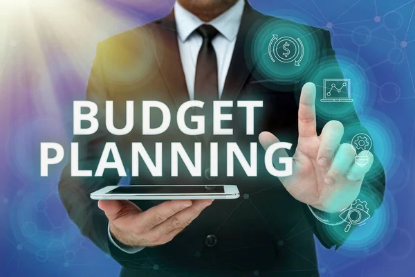 Text showing inspiration Budget Planning. Business idea process of constructing a budget and then utilizing it Man In Office Uniform Standing Pressing Virtual Button Holding Tablet. — Stock Photo, Image