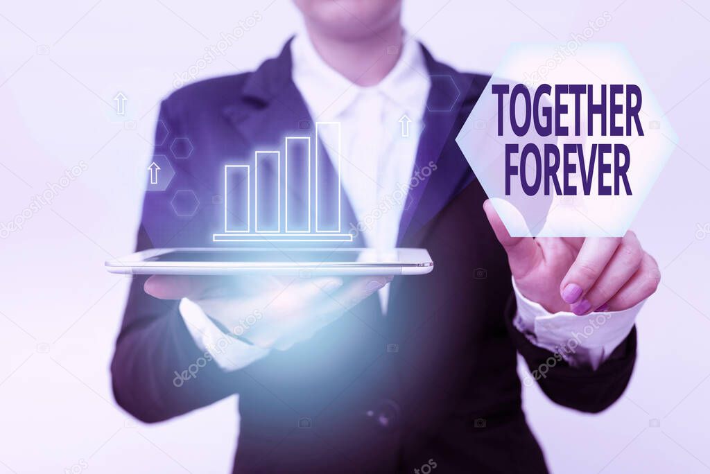 Text sign showing Together Forever. Concept meaning showing who promise to love one another for eternity Woman In Suit Holding Tablet Pointing Finger On Futuristic Virtual Button.