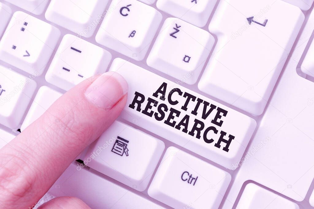 Handwriting text Active Research. Business overview Simultaneous process of taking action and doing research Lady finger showing-pressing keyboard keys-buttons for update